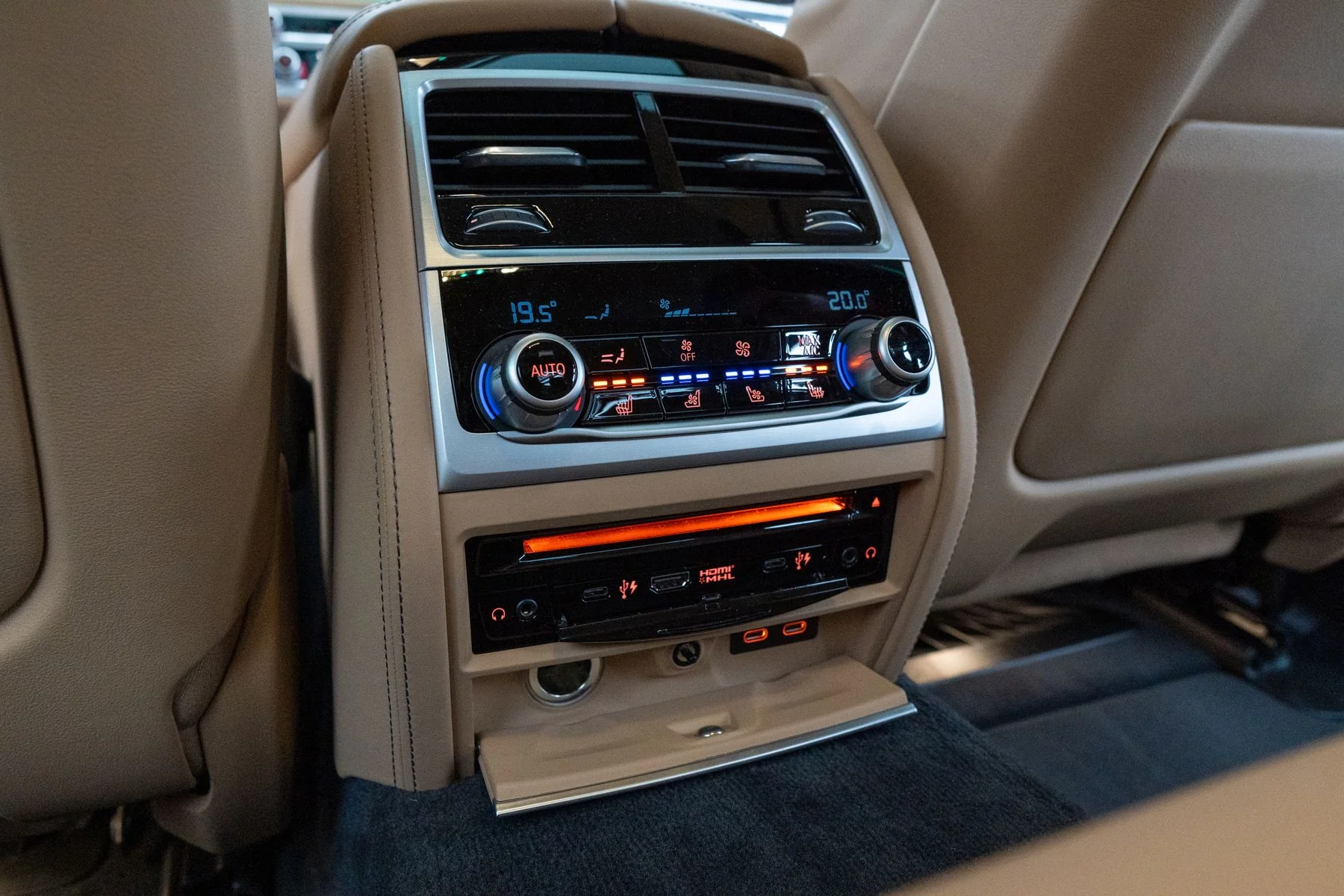 Automotive climate controls and air vents inside a modern vehicle
